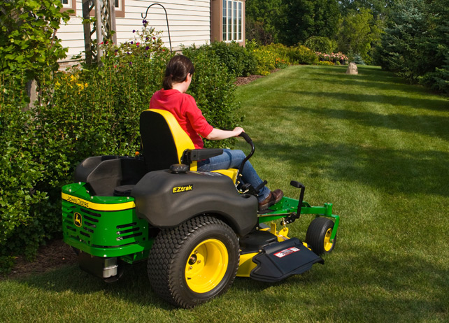 Woman on John Deere EZTrak Mower 