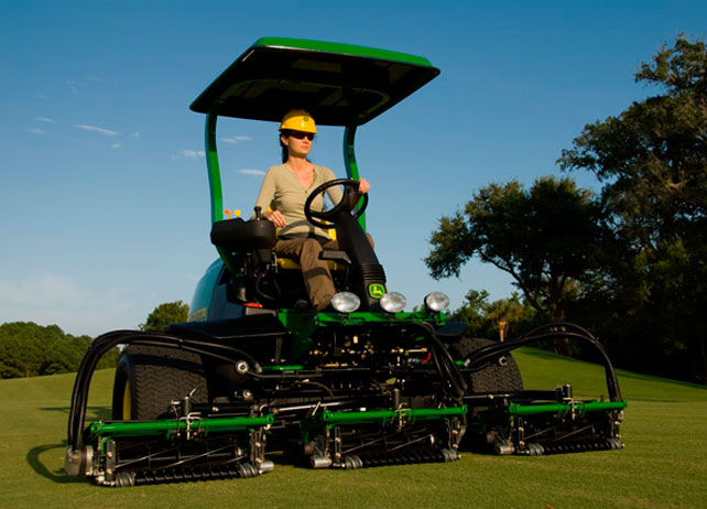Woman Driving John Deere Fairway Mower 