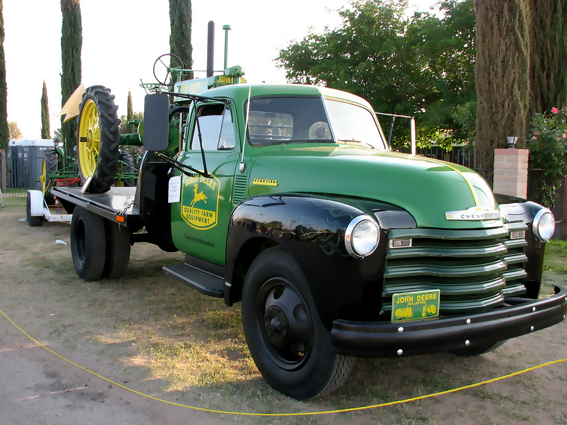 John Deere Trucks. Green ad black Chevy