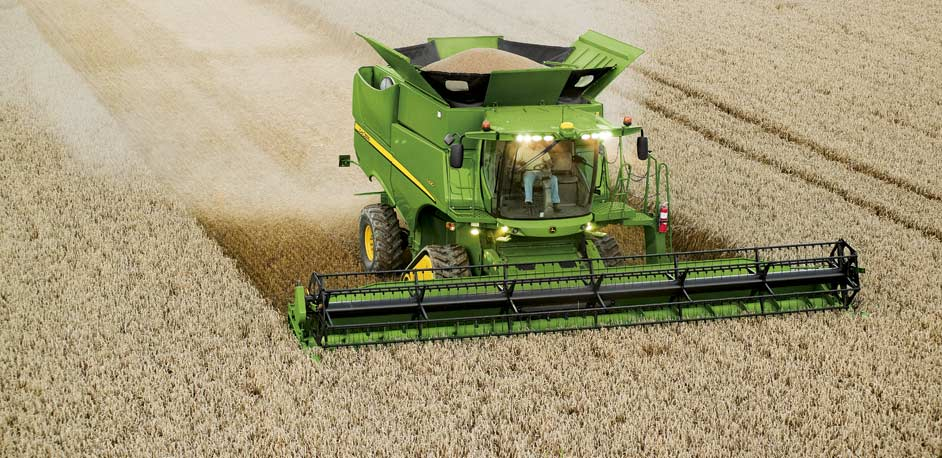 Combine Surrounded by Grain 